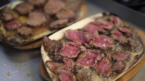 Fry steak raw meat beef. meat being fried butter and being heated in a pan Stock Footage 83590172