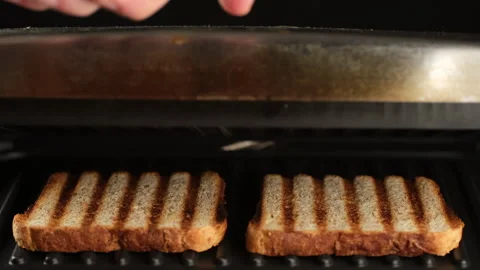 Fry toast bread on grill. Delicious Grilled Cheese Sandwich Stock Footage 242587195