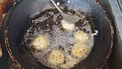 Fry the tofu manually Stock Footage 250828827