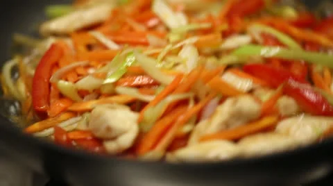 Fry vegetables with chicken Stock Footage 24636871