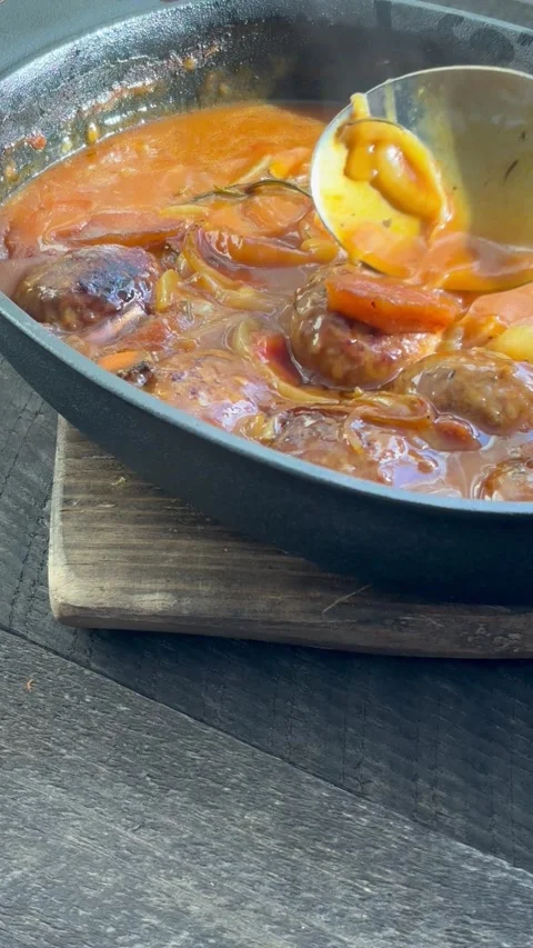 Fryed meatballs on black background, top view, Stock Footage 256052304