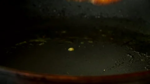 Frying acacia with egg in pan, in door  Chiangmai  Thailand. Stock Footage 282782243