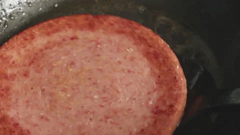 Frying And Flipping Freezer Burger  Stock Footage 238048413