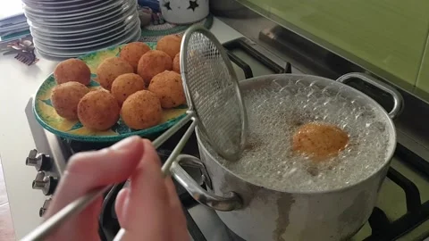 Frying "arancini" Stock Footage 139531814