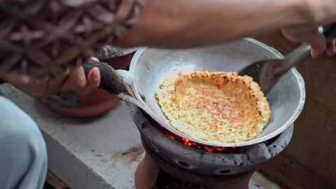 Frying on the back for the process of making Betawi-style egg crust Stock Footage 300621027