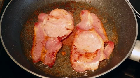 Frying bacon Stock Footage 56612076