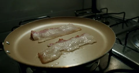 Frying Bacon on a Pan, Cooking, Close Shot, Cinematic Stock Footage 242441438