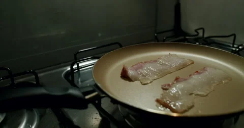 Frying Bacon on a Pan, Cooking at home, Close Shot, Cinematic Stock Footage 242441925