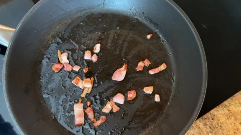 Frying Bacon in a Pan Video stock 278171628