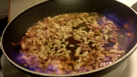 Frying bacon with whisky Stock Footage 91946218