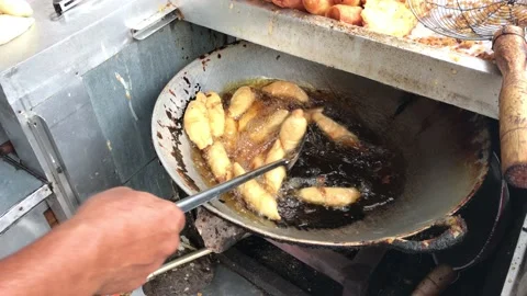 Frying Bananas In A Pan Stock Footage 168918929