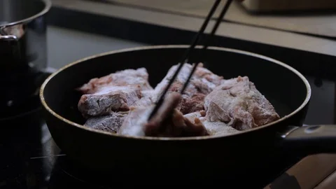 Frying beef ribs Stock Footage 120462637