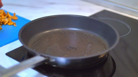 Frying beef steak in a pan Stock Footage 114078996