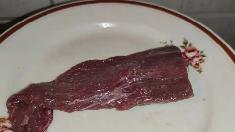 Frying a beef steak in the pan 動画素材 240958932