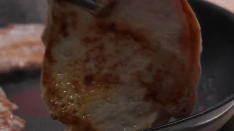 Frying Beef Steaks in Pan. Stock Footage 256237595