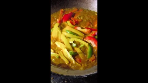 Frying bell pepper with sauce in pan, in door  Chiangmai  Thailand. Stock Footage 293408195