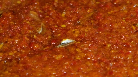 Frying Blended Chilli, Potato Cubes and Anchovies Video stock 127734751