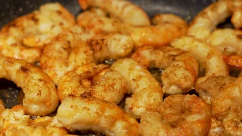 Frying Boiling Of Large Delicious Shrimp Seasoned With Spices, Close-up. Cooking Stock Footage 159966574