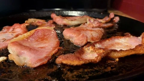 FRYING BRITISH BACON Stock Footage 104377607