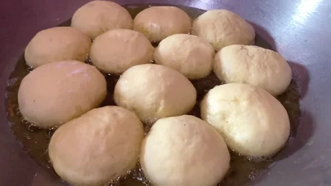 Frying bun on the pan Stock Footage 288913162