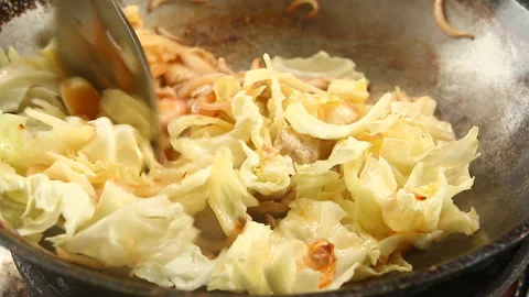 Frying cabbage with pork in pan , Chiangmai Thailand Stock Footage 141430660