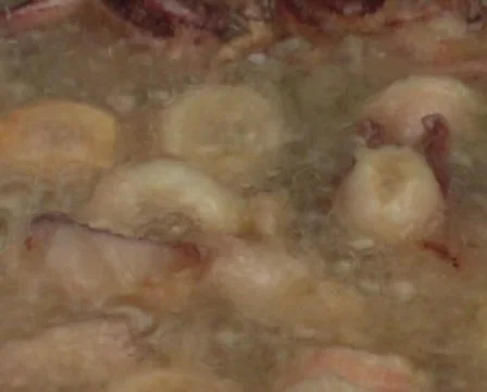 Frying calamari  Stock Footage 64210