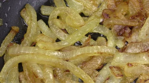 Frying Caramelized Onions Sizzling In pan Stock Footage 65705428