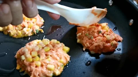 Frying Carrot Corn Fritters Stock Footage 148383568