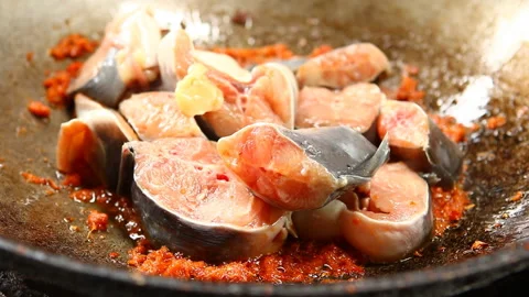 Frying cat fish with chili paste in pan, Thai famous food Stock Footage 133225197