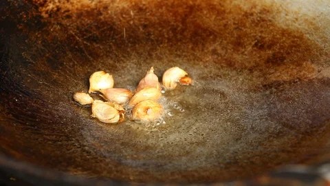 Frying Chayote leaves vegetable with egg in pan, Chiangmai Thailand Stock Footage 104807961