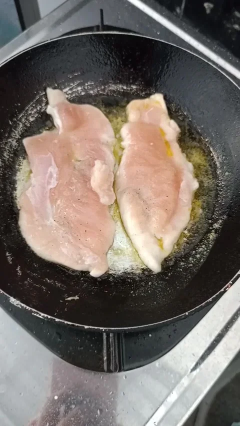 Frying chicken breast fillet Stock Footage 284508825