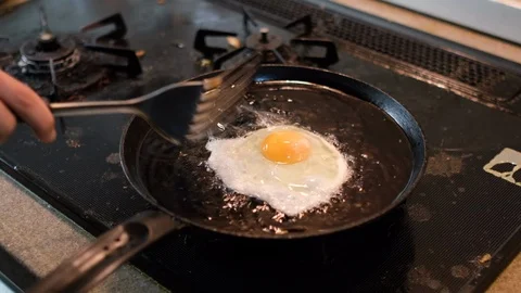 Frying Chicken Egg Stock-Footage 103794963