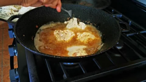 Frying Chicken at Home Stock Footage 168336767