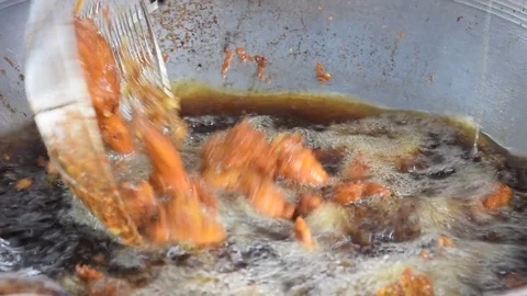 Frying chicken in a large saucepan. Stock Footage 82207202