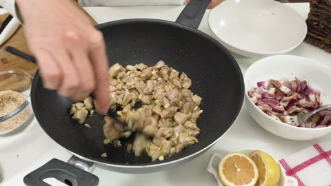 Frying chicken meat on a frying pan. Chicken tacos recipe Stock Footage 138268102