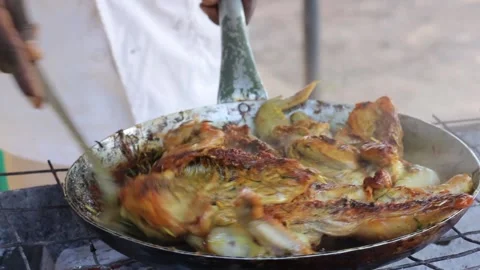 Frying chicken in the pan Stock Footage 165663302