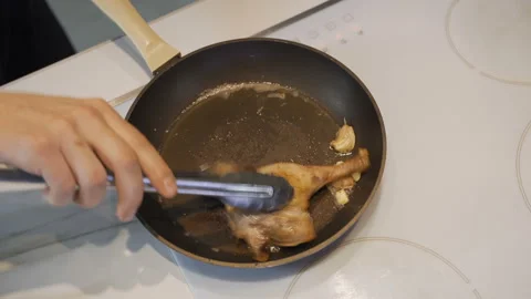 Frying chicken in pan with Vegetables Video stock 104538127