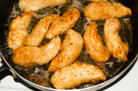 Frying chicken Stock Photos
