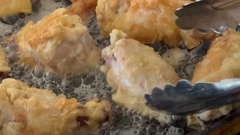 Frying chicken wings Stock Footage 220434979