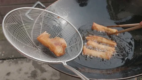 Frying Chinese Spring Rolls Stock Footage 102357595