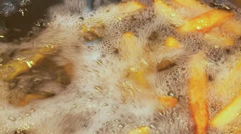 Frying chips close up Stock Footage 11923167