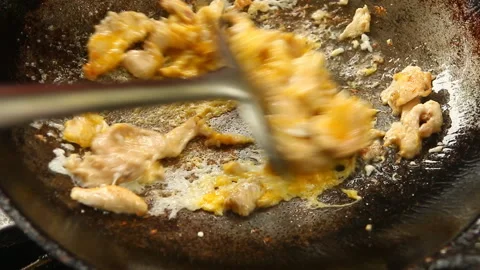 Frying chopped chicken and egg in pan, Thai street food. Stock Footage 151626229