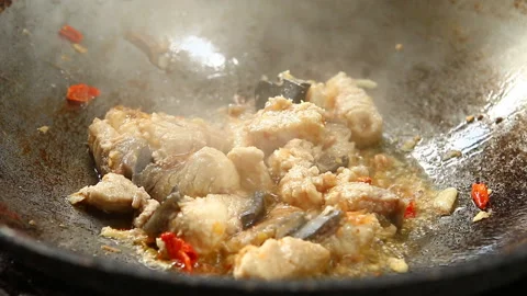 Frying chopped fish  with chili in pan , in door  Chiangmai  Thailand Stock Footage 137241108