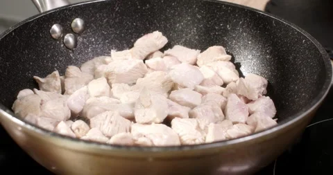 Frying chopped meat on a pan. smooth camera zoom Stock Footage 244372269