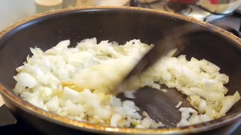 Frying chopped onion and minced pork on a Teflon pan. Stock Footage 50311533
