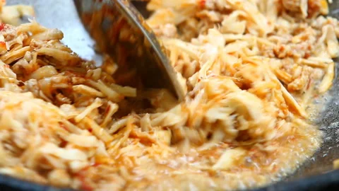 Frying chopped pickled bamboo shoot in pan, Thai northern style food. Stock Footage 153510274