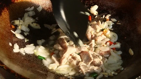 Frying chopped pork with onion in pan Stock-Footage 89573476
