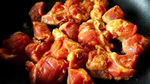 Frying chopped pork in pan , in door  Chiangmai  Thailand Stock Footage 246807319