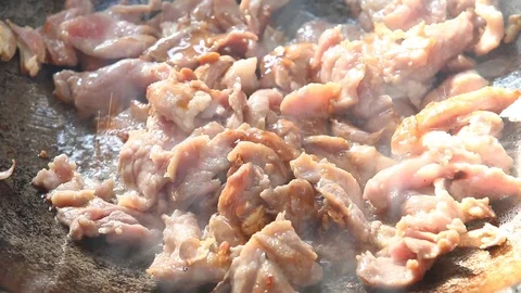 Frying chopped pork  in pan Stock Footage 89902994