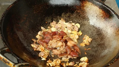 Frying  chopped pork with sauce in pan, Thai street food Stock Footage 105853443